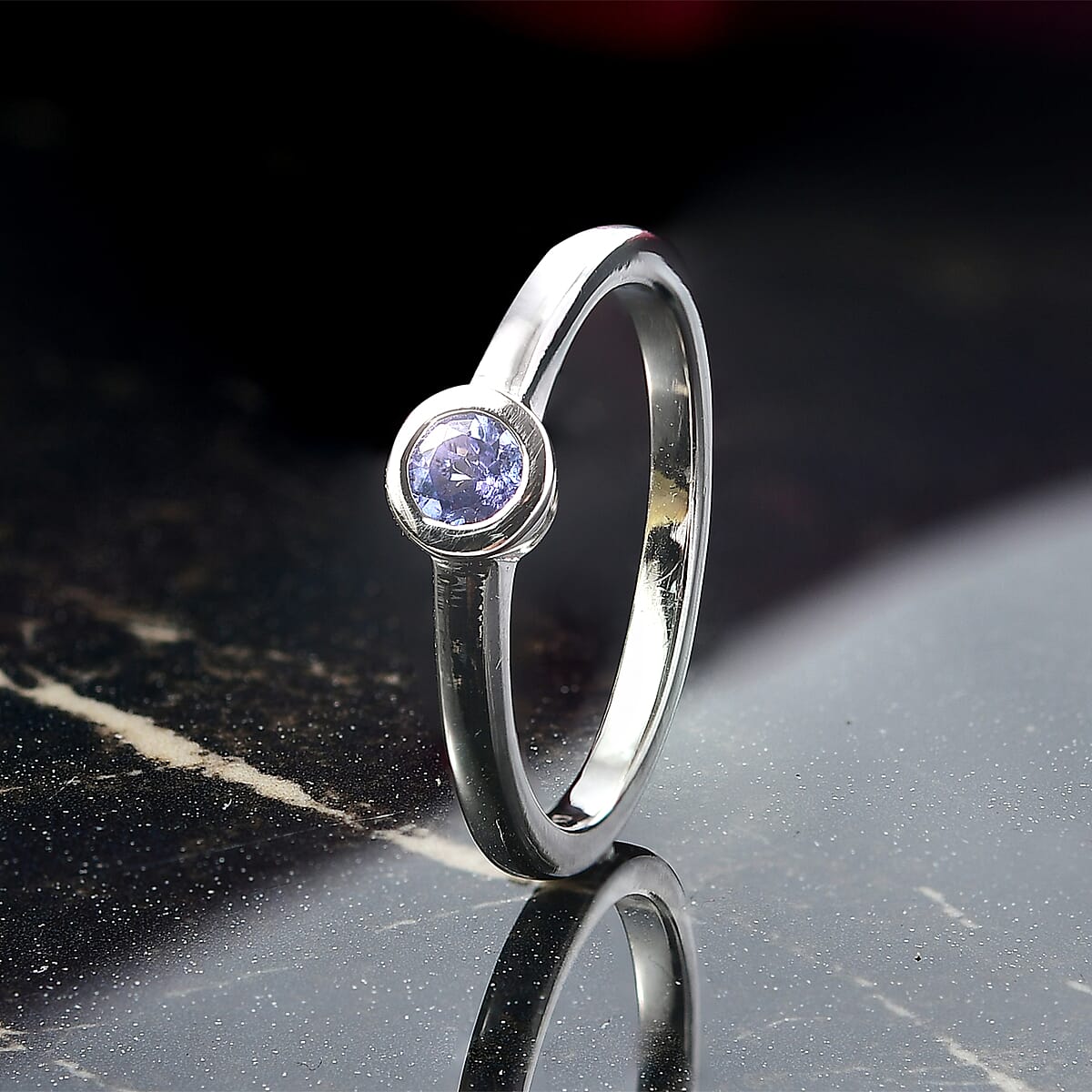 D'Joy Poke Free Tanzanite 0.25 ctw Solitaire Ring in Rhodium Over Sterling Silver (Size 9.0) image number 1