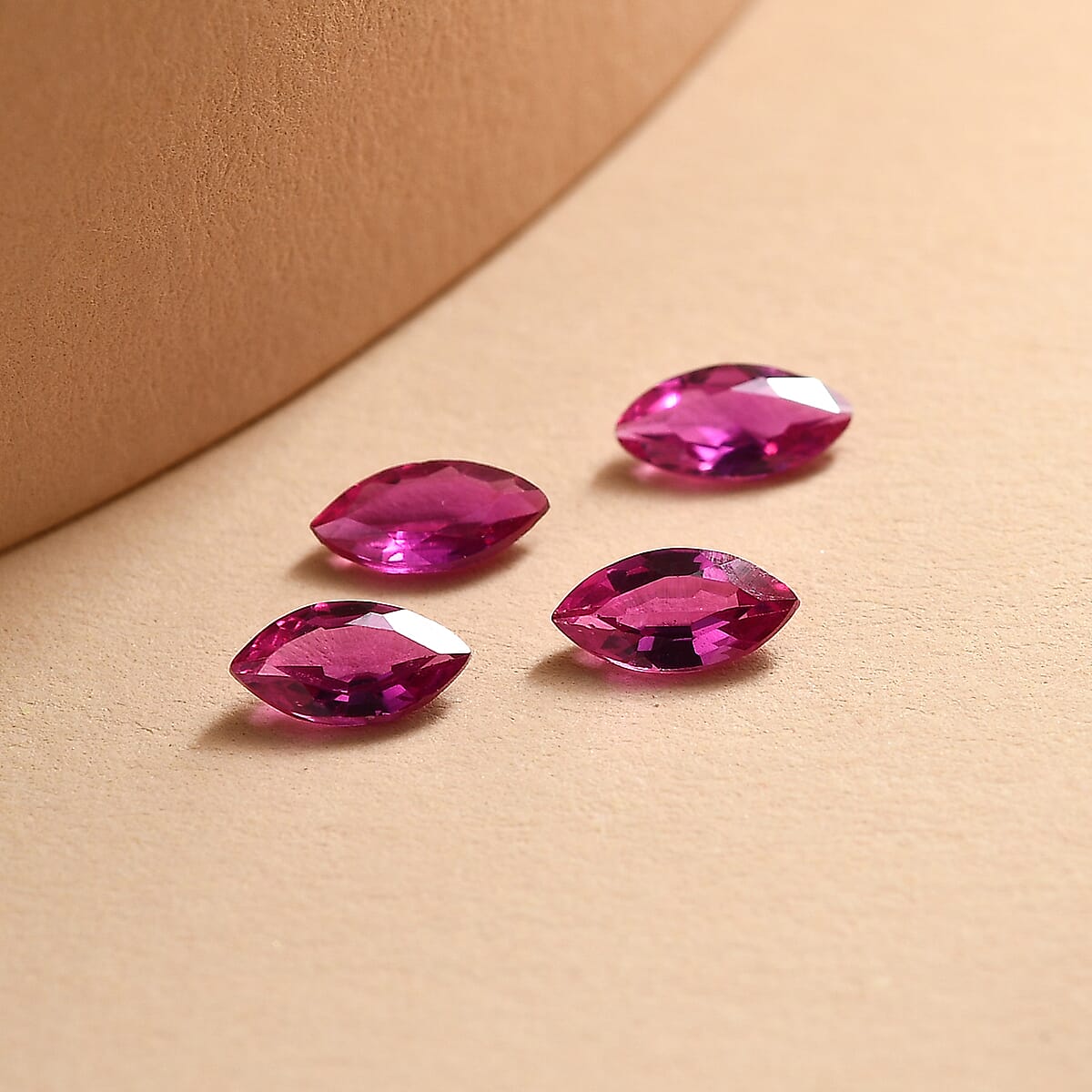 Set of 4 Lab Created Ruby (Mrq 5x2.5 mm) 0.64 ctw Loose Gemstone image number 1