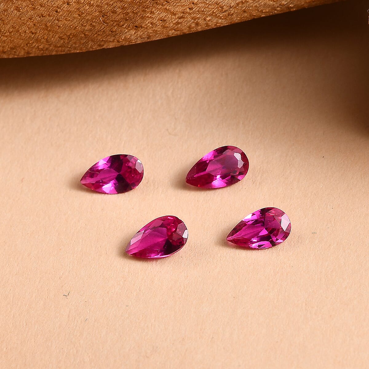 Set of 4 Lab Created Ruby (Pear 5x3 mm) 0.80 ctw Loose Gemstone image number 1