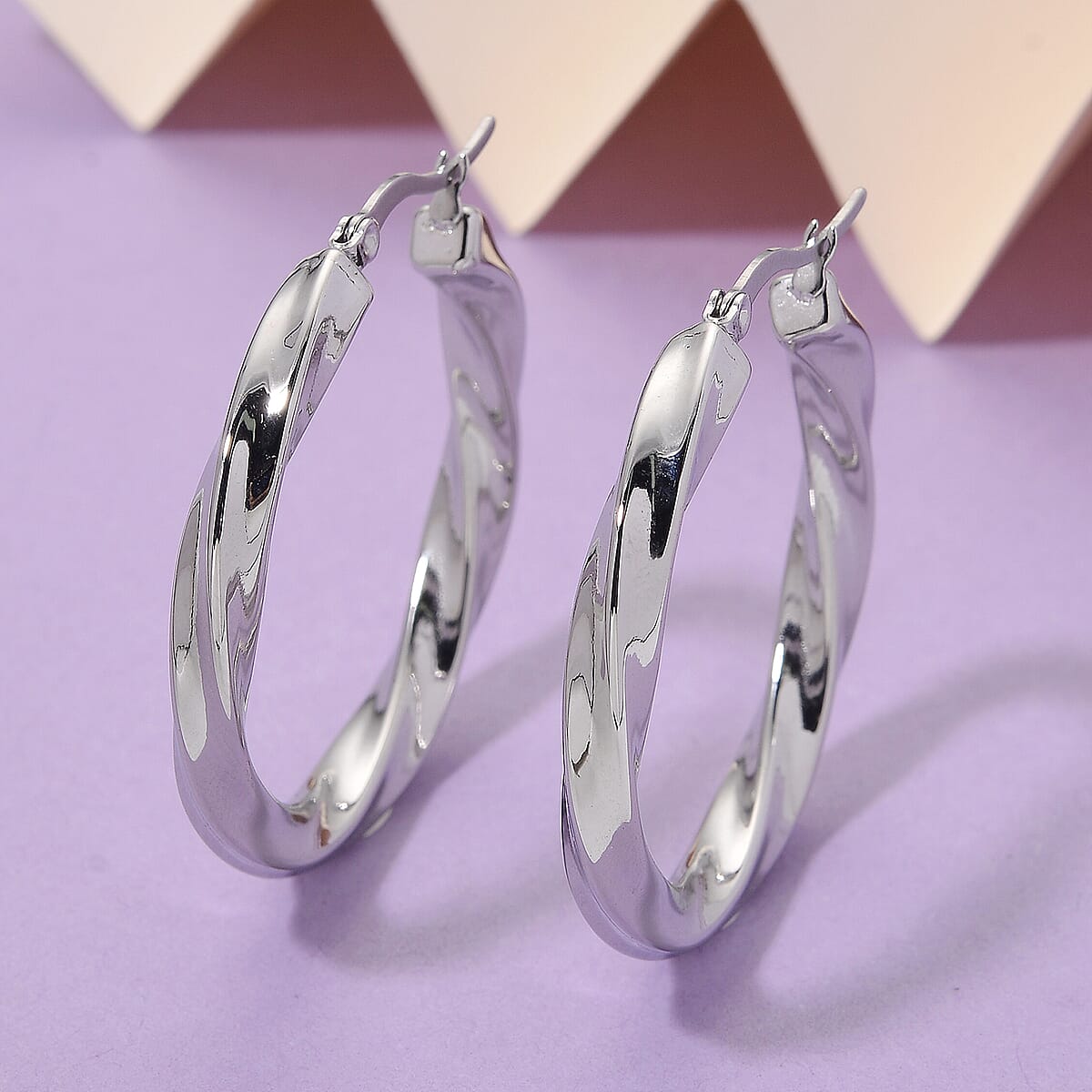 Twisted Hoop Earrings in Stainless Steel image number 1