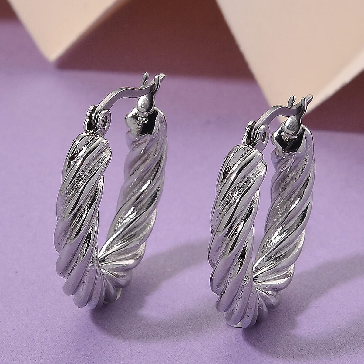 Twisted Hoop Earrings in Stainless Steel image number 1