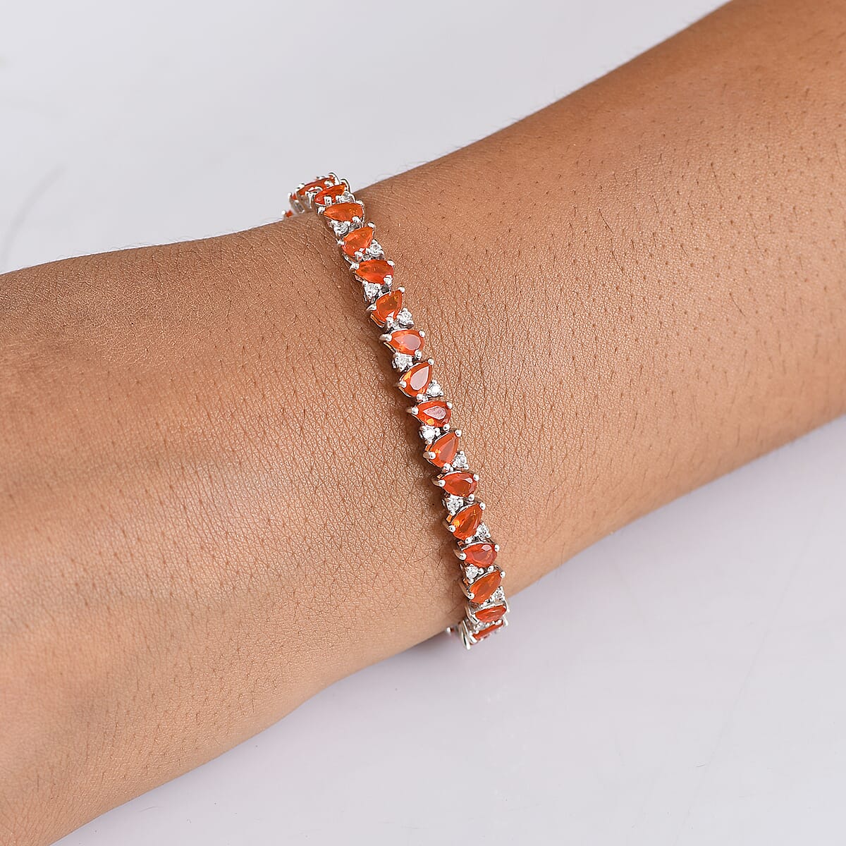 D'Joy AAA Crimson Fire Opal and White Zircon 5.70 ctw Bracelet in Rhodium Over Sterling Silver (7.00 In) image number 2