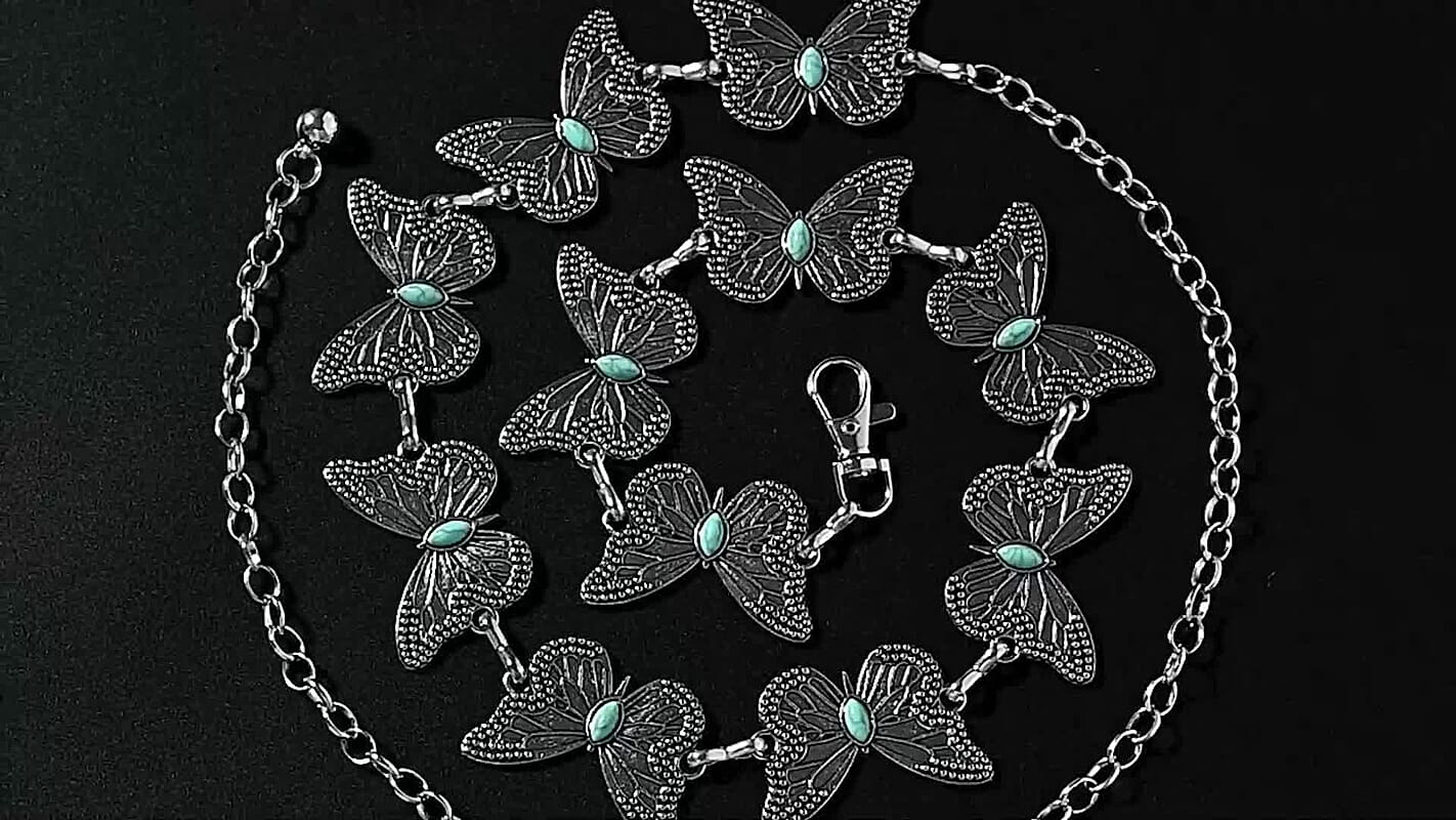 Tamsy Silvertone Floral Design Concho Belt (51.2")