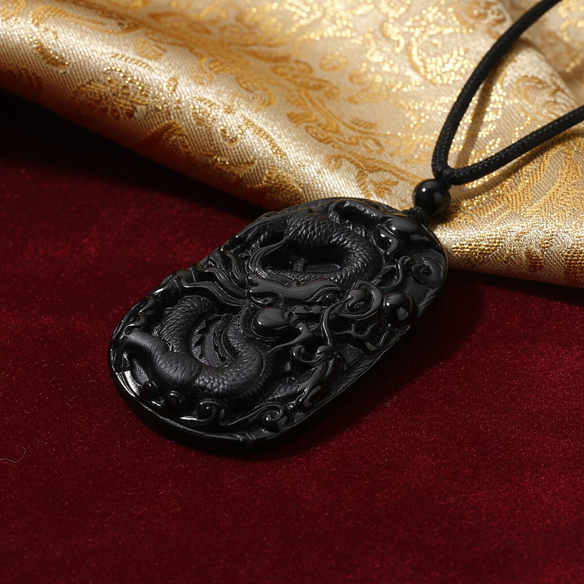 Black Jade (D) 125.00 ctw Carved Dragon Pendant with Black Cord Necklace 28 Inches image number 1
