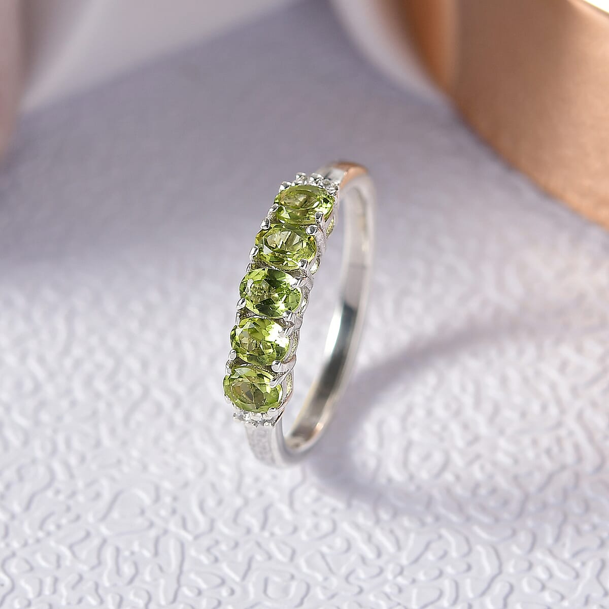 D'Joy Hebei Peridot and White Zircon 0.90 ctw Band Ring in Rhodium Over Sterling Silver (Size 7.0) image number 1