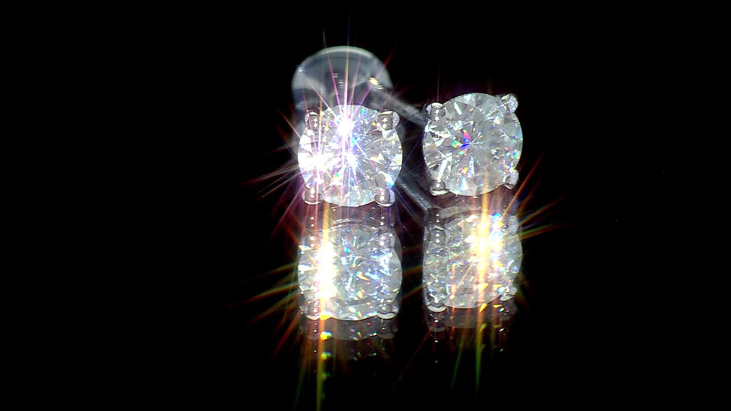 D'Joy Moissanite 0.90 ctw Solitaire Stud Earrings in Rhodium Over Sterling Silver