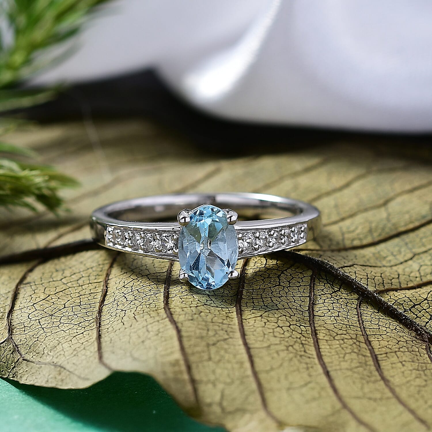 D'Joy Sky Blue Topaz, White Zircon Ring in Rhodium Over Sterling Silver (Size 8.0) 1.25 ctw