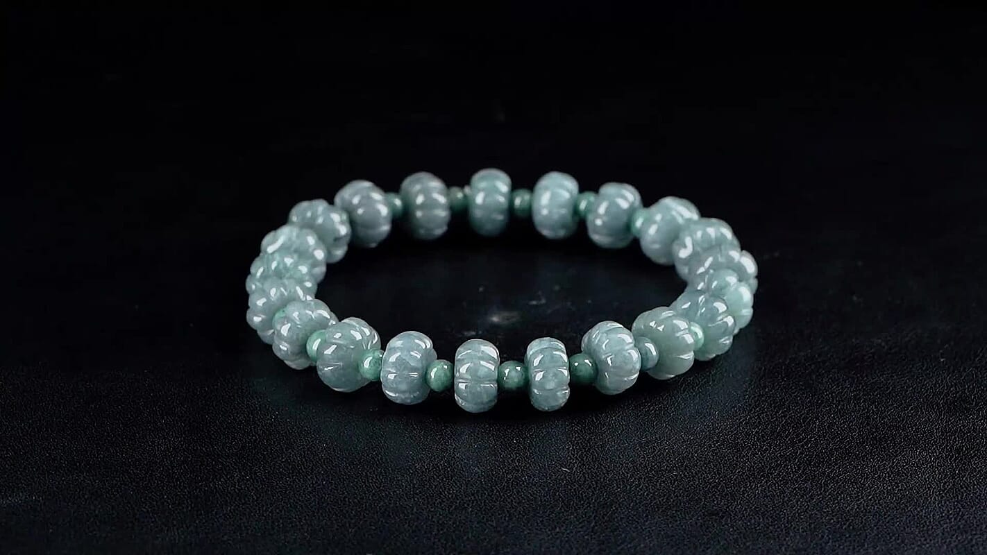 Natural Olmec Jadeite 130.00 ctw Carved Beaded Stretch Bracelet