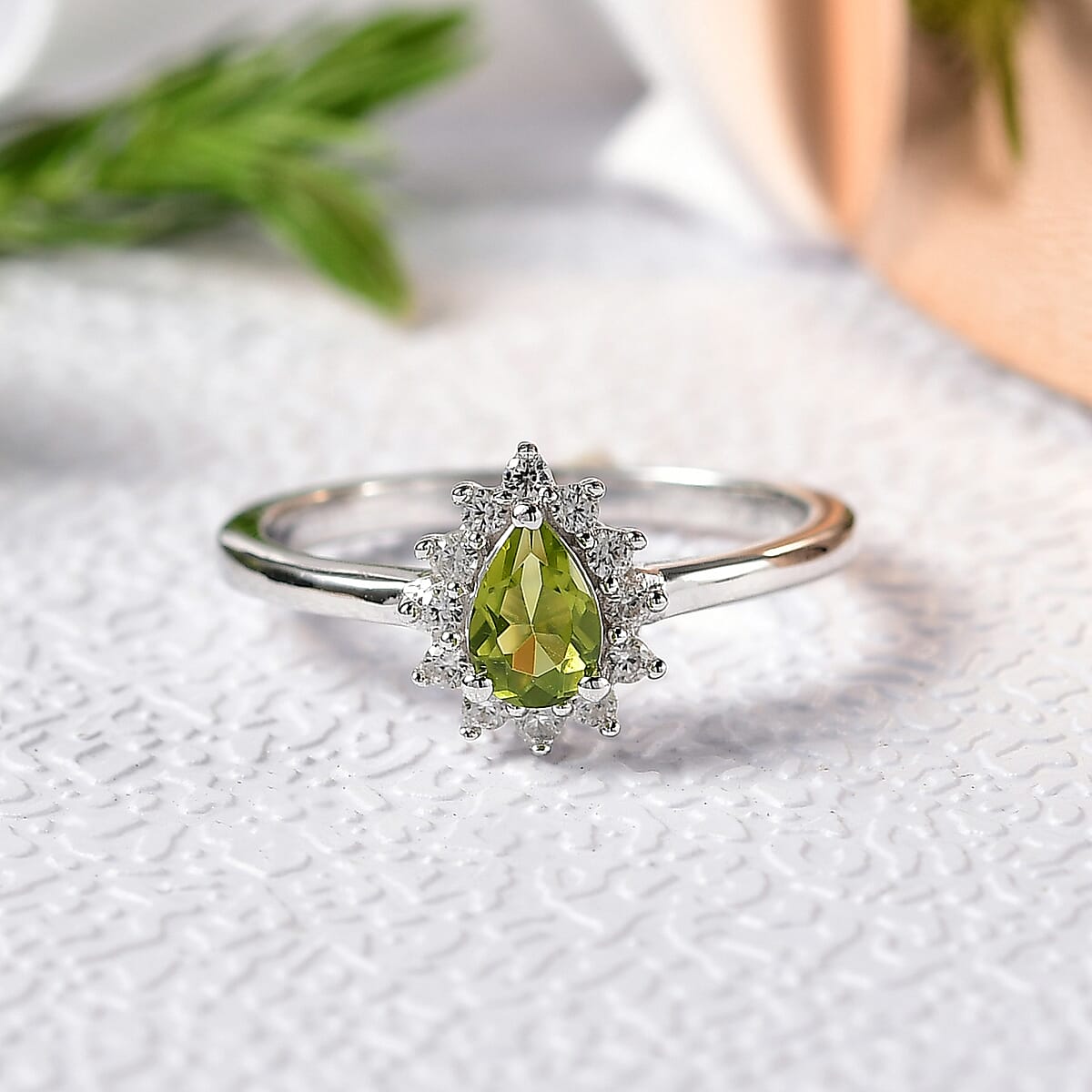 D'Joy Hebei Peridot and White Zircon 0.70 ctw Ring in Rhodium Over Sterling Silver (Size 5.0) image number 1