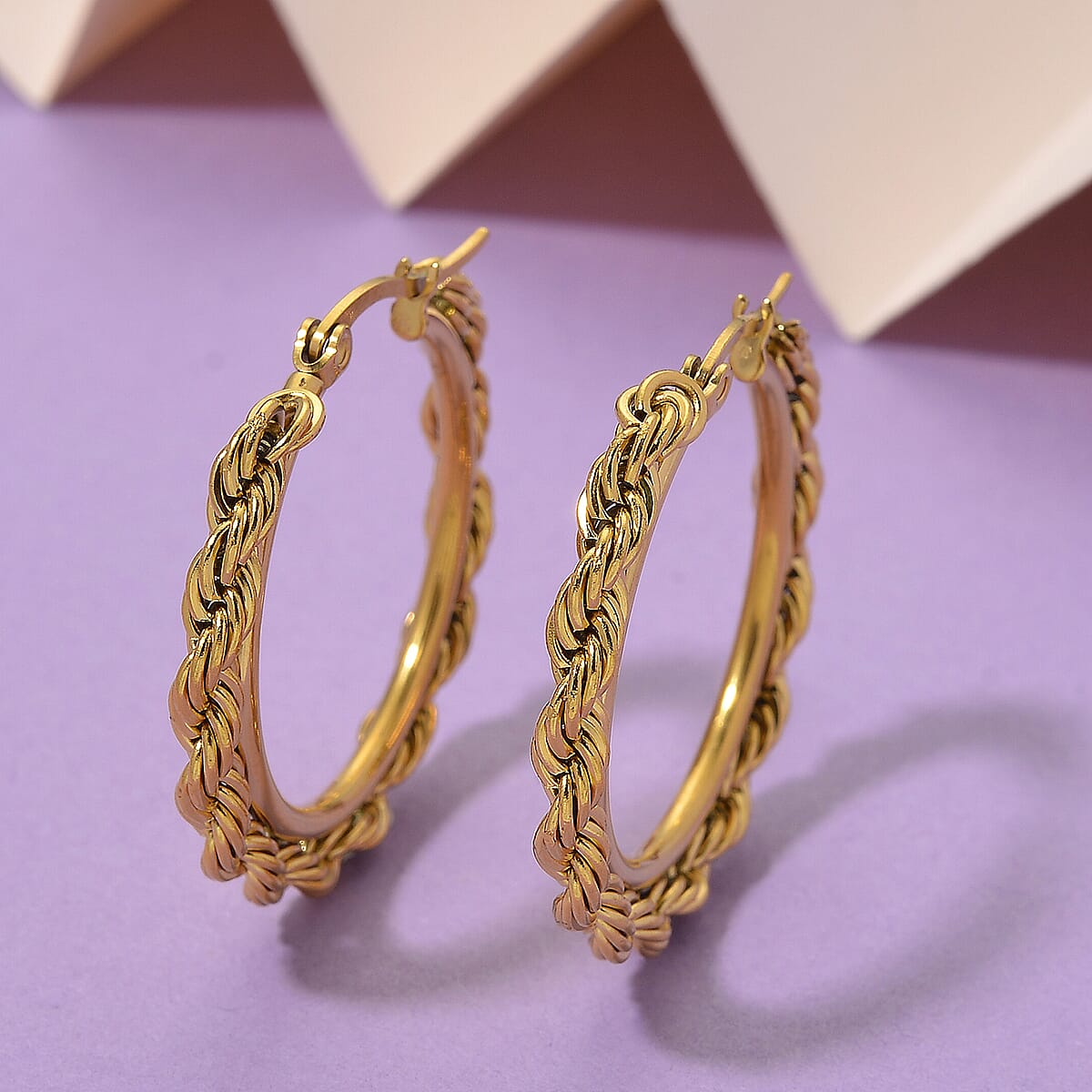Rope Chain Hoop Earrings in ION Plated YG Stainless Steel image number 1