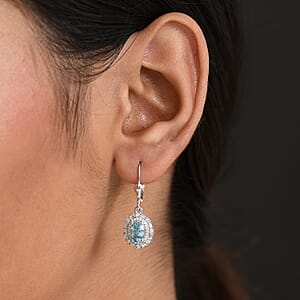 D'Joy Premium Camboidan Blue Zircon and Moissanite 3.25 ctw Crown Halo Earrings in Rhodium Over Sterling Silver