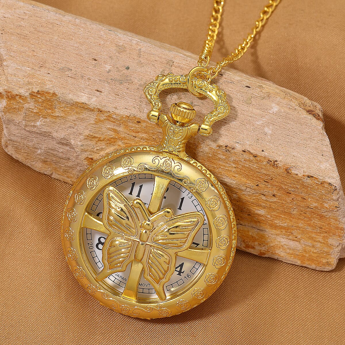 Strada Japanese Movement Rose Pattern Rotating Butterfly Pocket Watch with Chain (36 Inches) in Goldtone image number 1