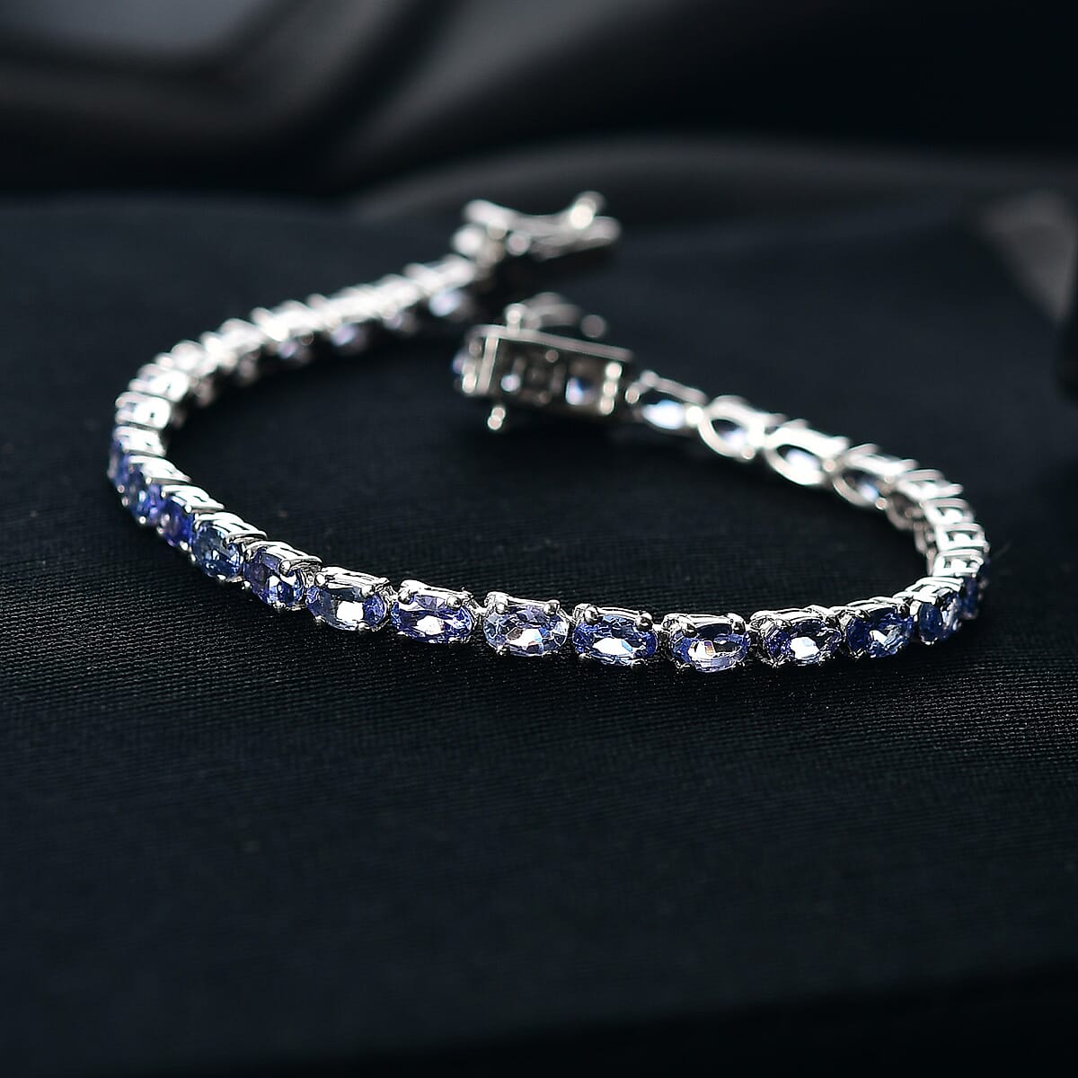 Doorbuster D'Joy Tanzanite 7.00 ctw Blue Floral Vines Bracelet in Rhodium Over Sterling Silver (6.50 In) image number 1