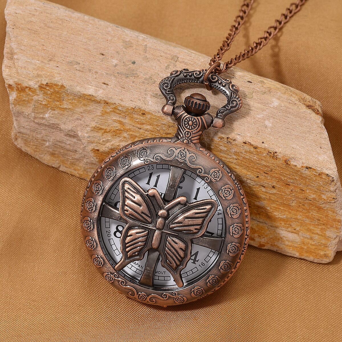 Strada Japanese Movement Rose Pattern Rotating Butterfly Pocket Watch with Chain (36 Inches) in Rosetone image number 1