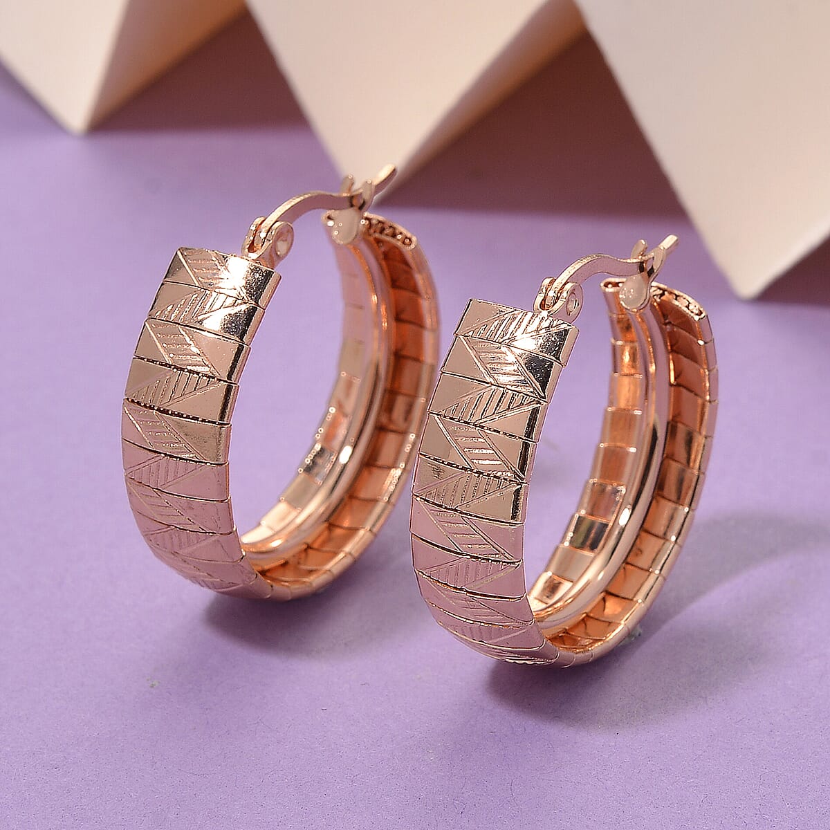 Omega Chain Hoop Earrings in ION Plated RG Stainless Steel image number 1