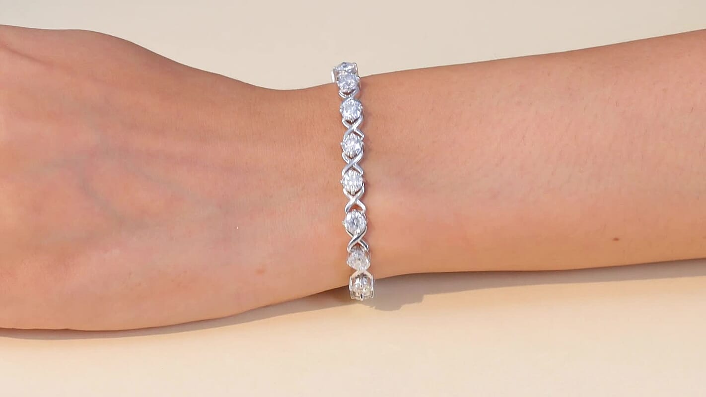 D'Joy Moissanite (Rnd 5mm) XOXO Bracelet in Rhodium Over Sterling Silver (7.25 In) 9.00 ctw
