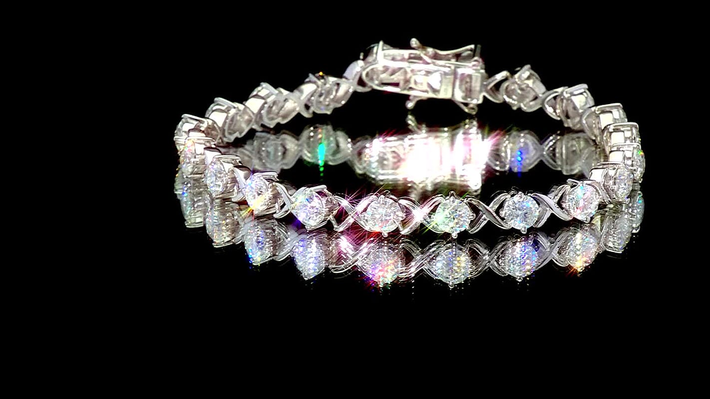 D'Joy Moissanite (Rnd 5mm) XOXO Bracelet in Rhodium Over Sterling Silver (7.25 In) 9.00 ctw