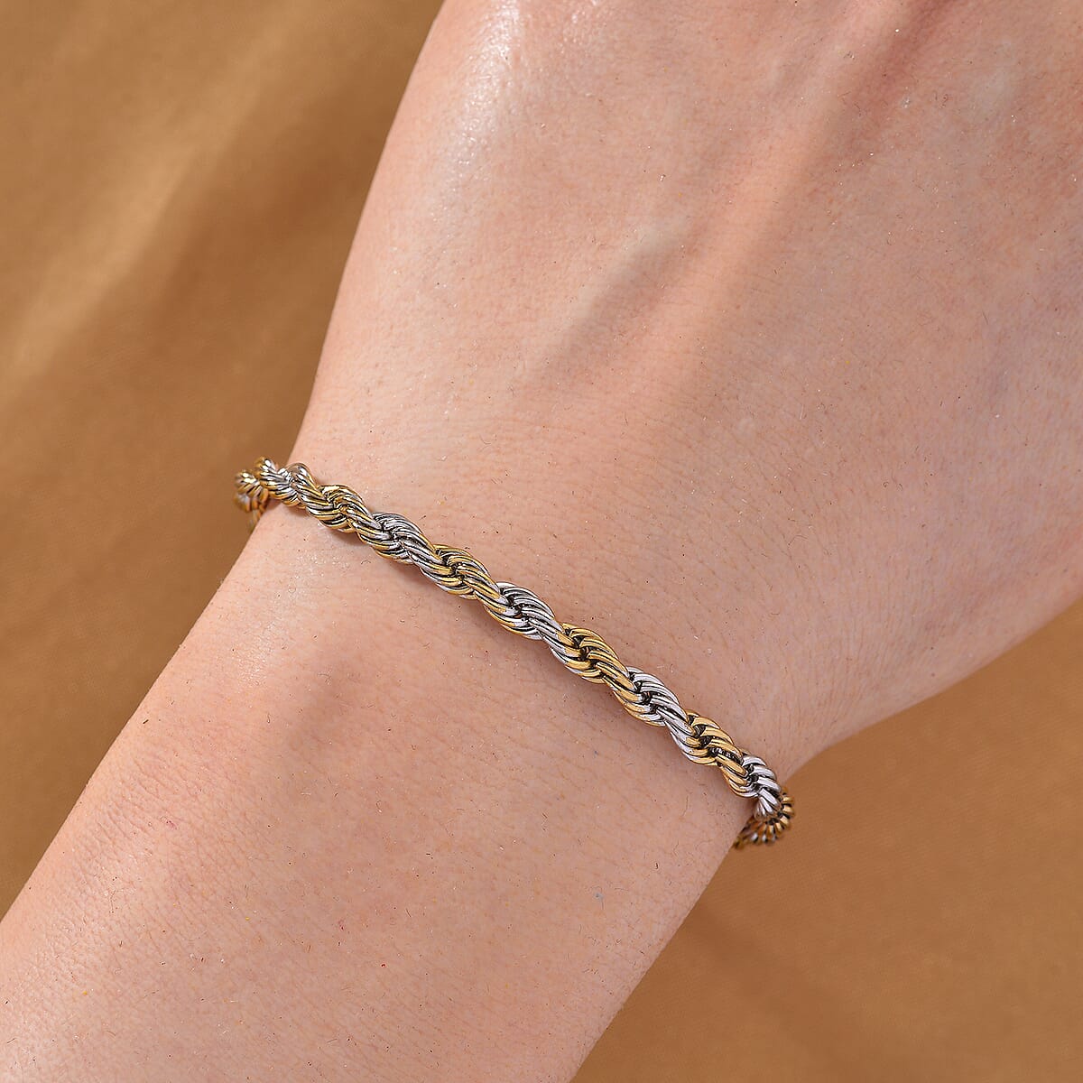 Rope Chain Bracelet (7.5-9.5In) in ION Plated YG and Stainless Steel image number 1
