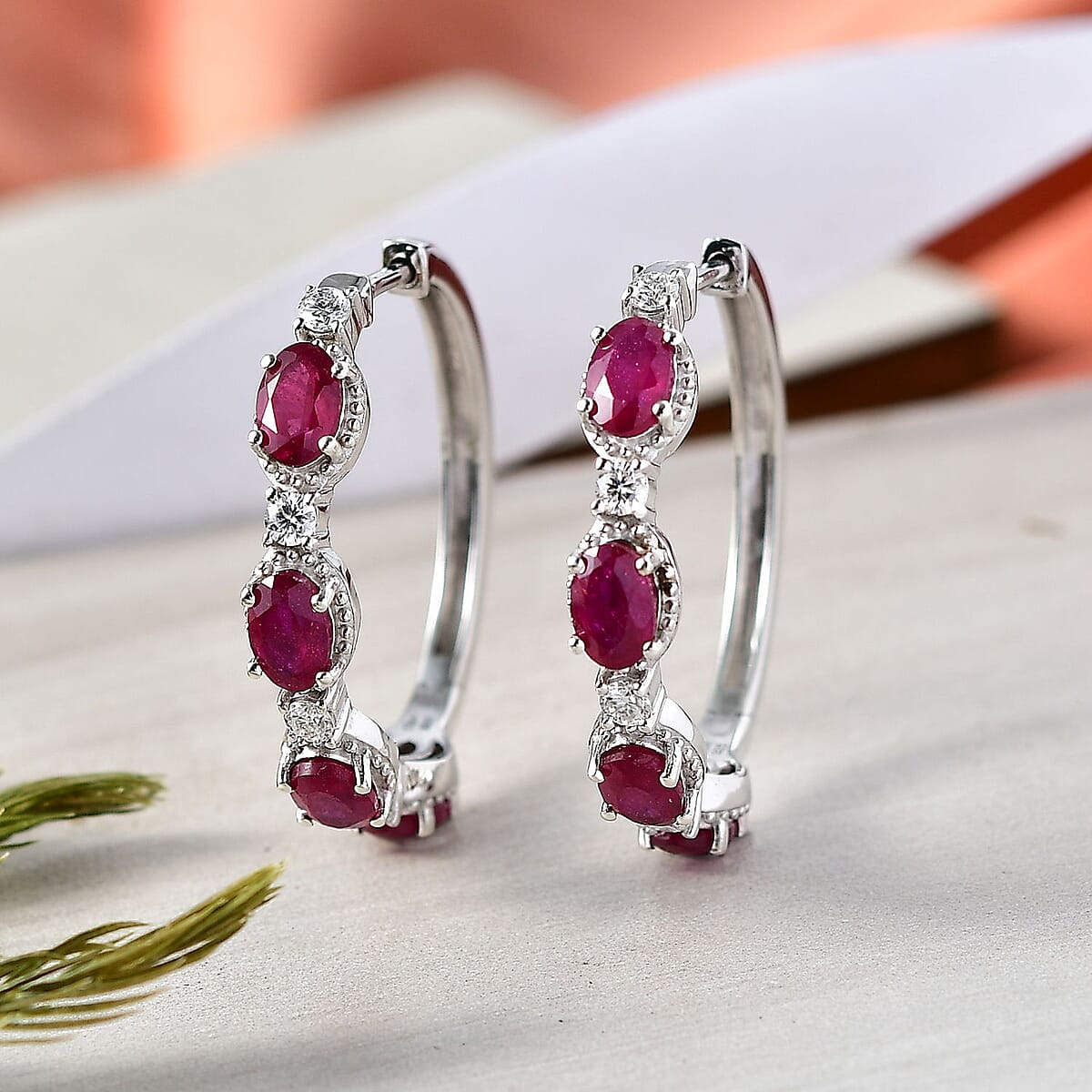 Doorbuster D'Joy Niassa Ruby (FF) and Moissanite 5.75 ctw Station Hoop Earrings in Rhodium Over Sterling Silver image number 1