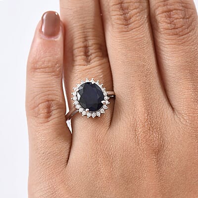 D'Joy Kanchanaburi Blue Sapphire and Moissanite 5.30 ctw Starlit Aura Ring in Rhodium Over Sterling Silver (Size 10.0)