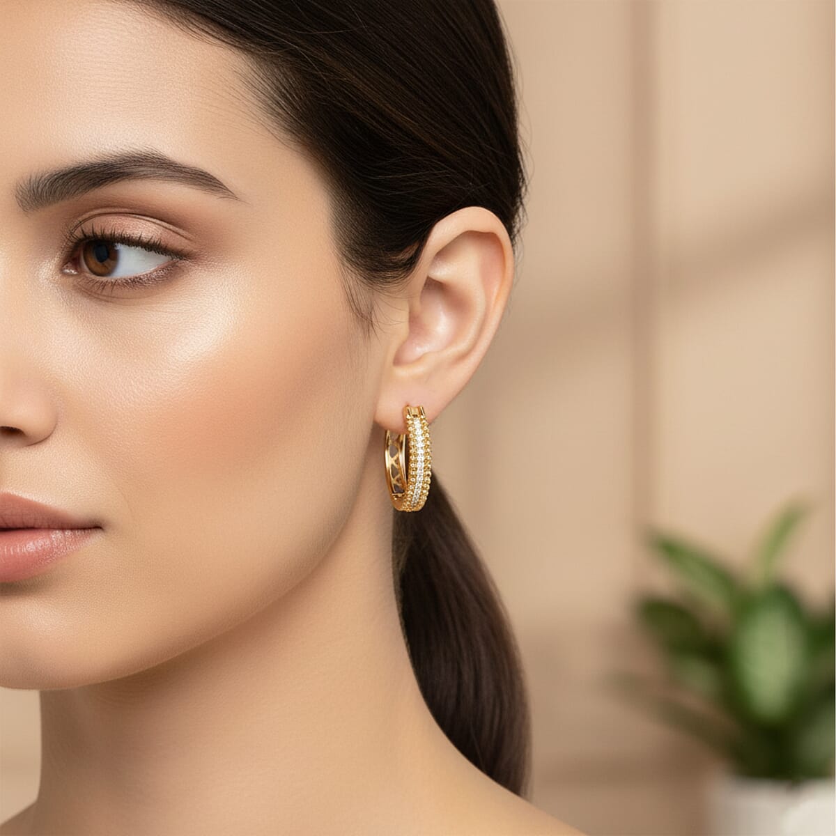 Simulated Diamond Hoop Earrings in Goldtone image number 2