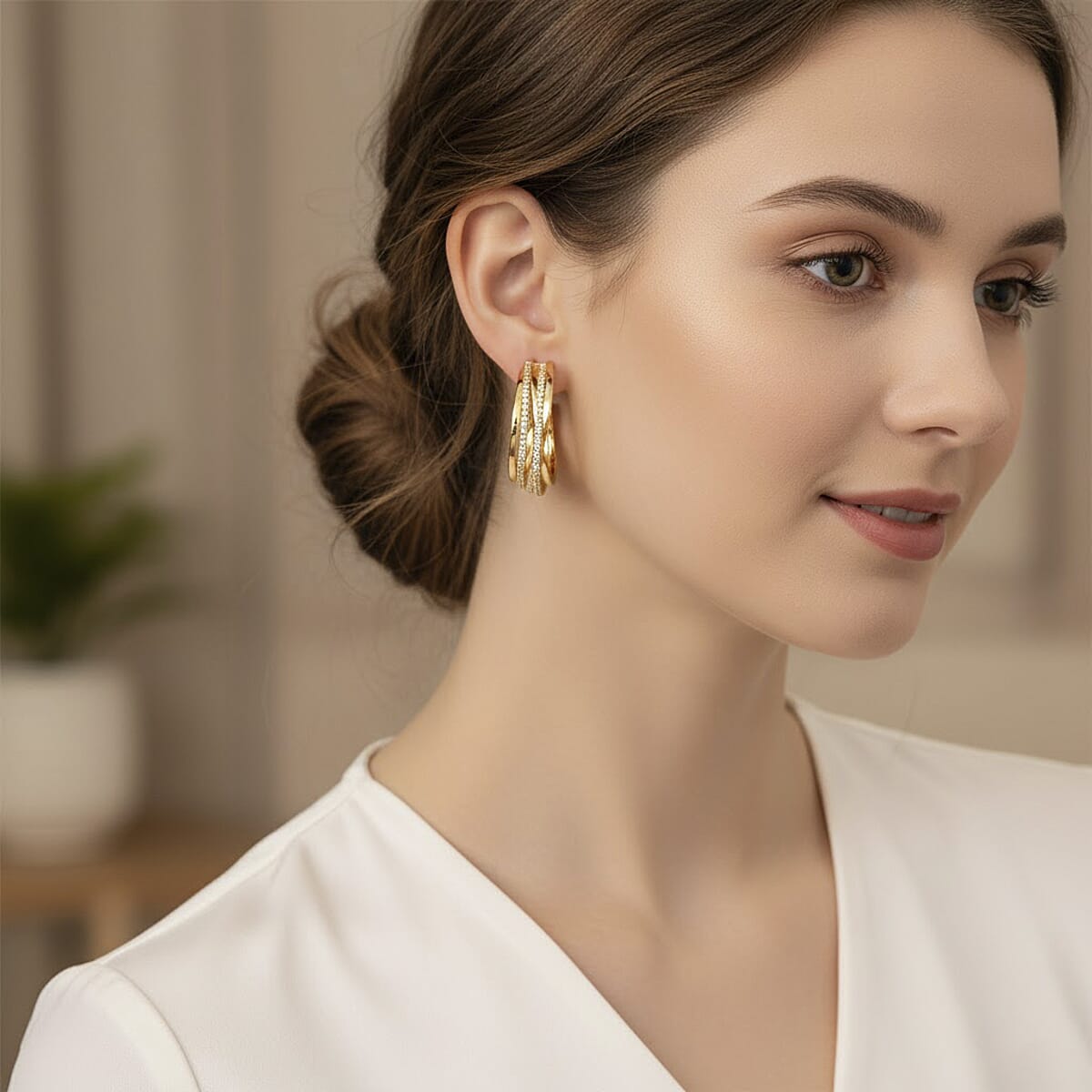 Simulated Diamond Hoop Earrings in Goldtone image number 2