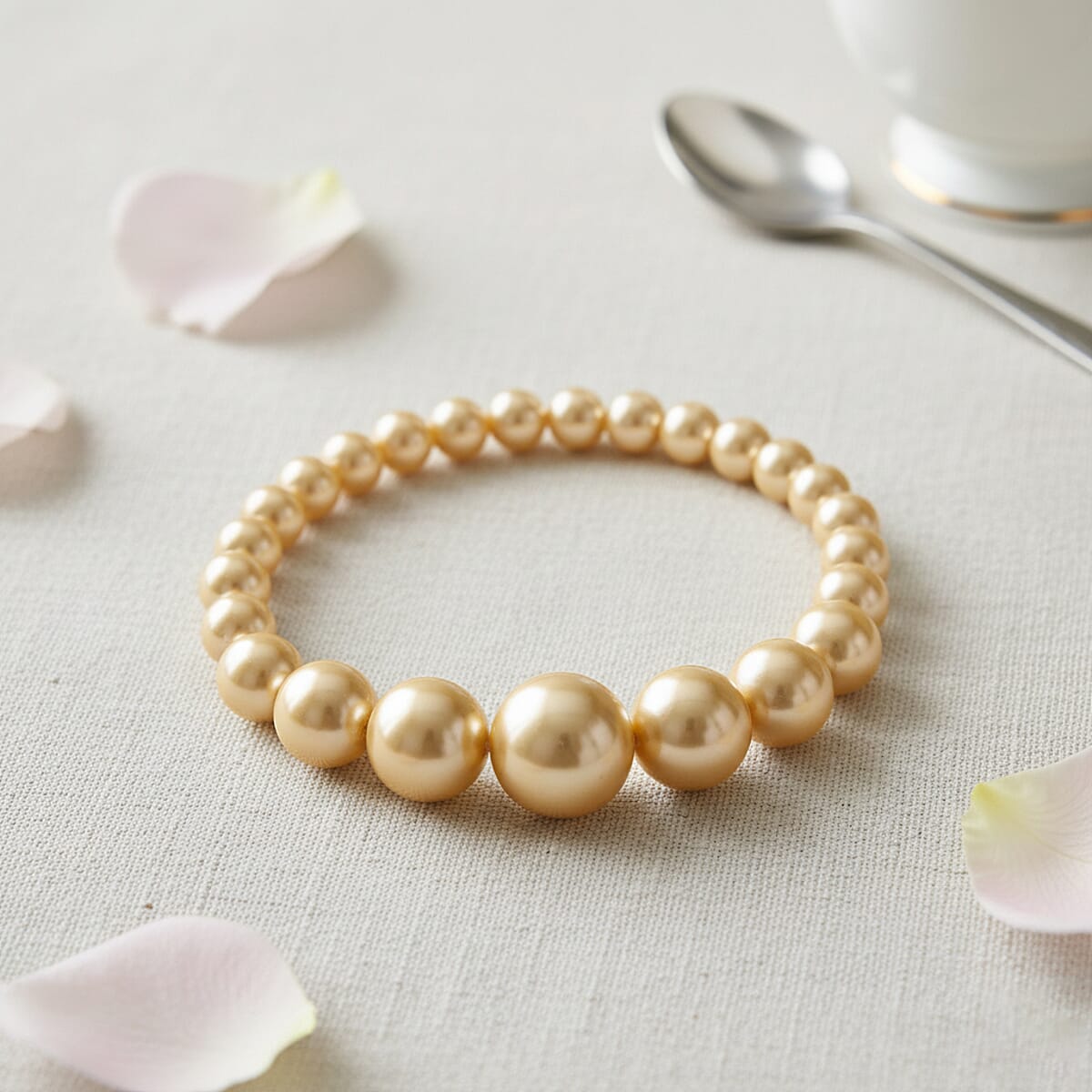 Golden Shell Pearl Stretch Bracelet (7-7.5In) image number 1