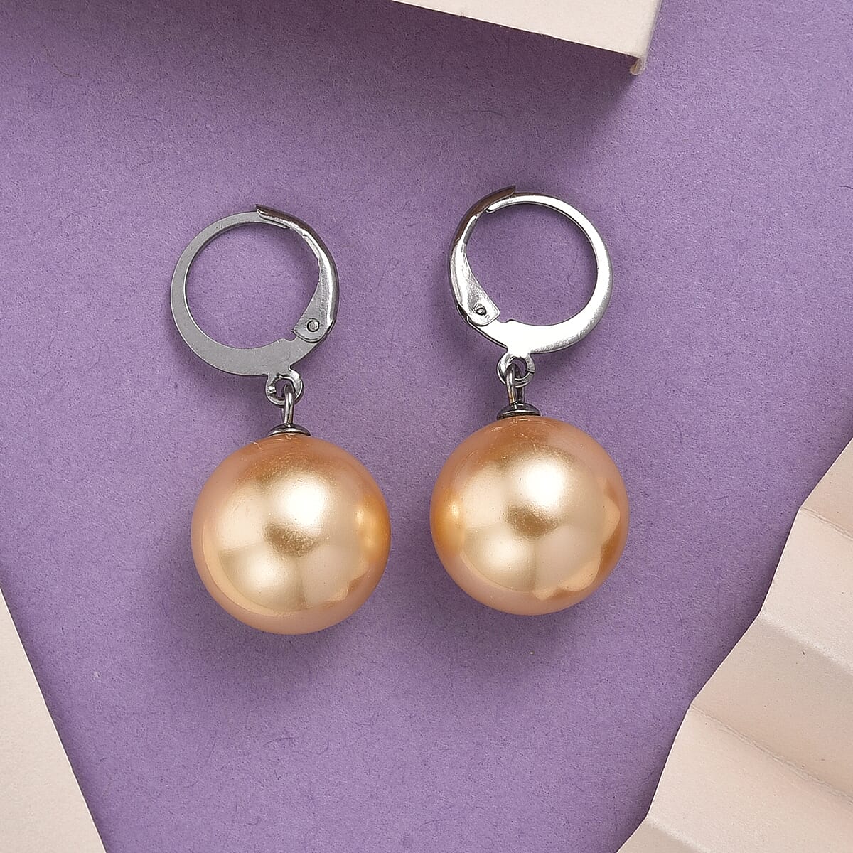 Golden Shell Pearl Dangling Earrings in Stainless Steel image number 1