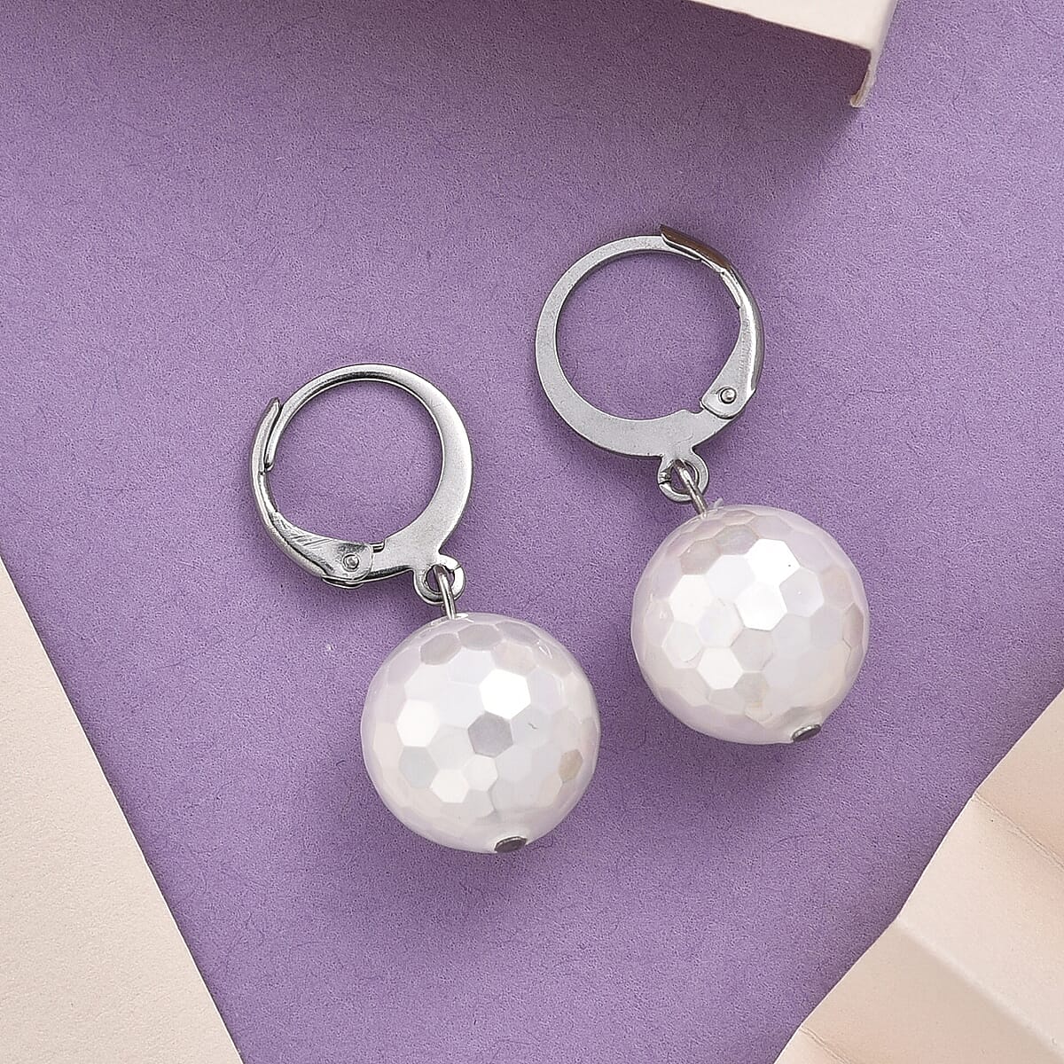 White Shell Pearl Dangling Earrings in Stainless Steel image number 1