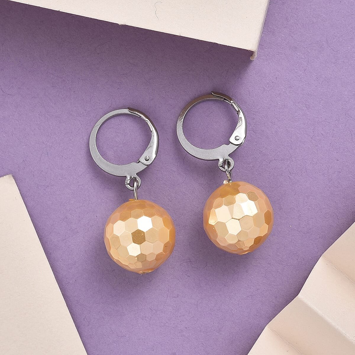 Golden Shell Pearl Dangling Earrings in Stainless Steel image number 1