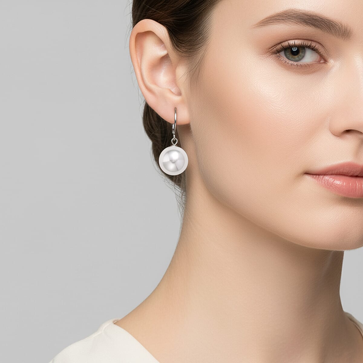 White Shell Pearl Dangling Earrings in Stainless Steel image number 2