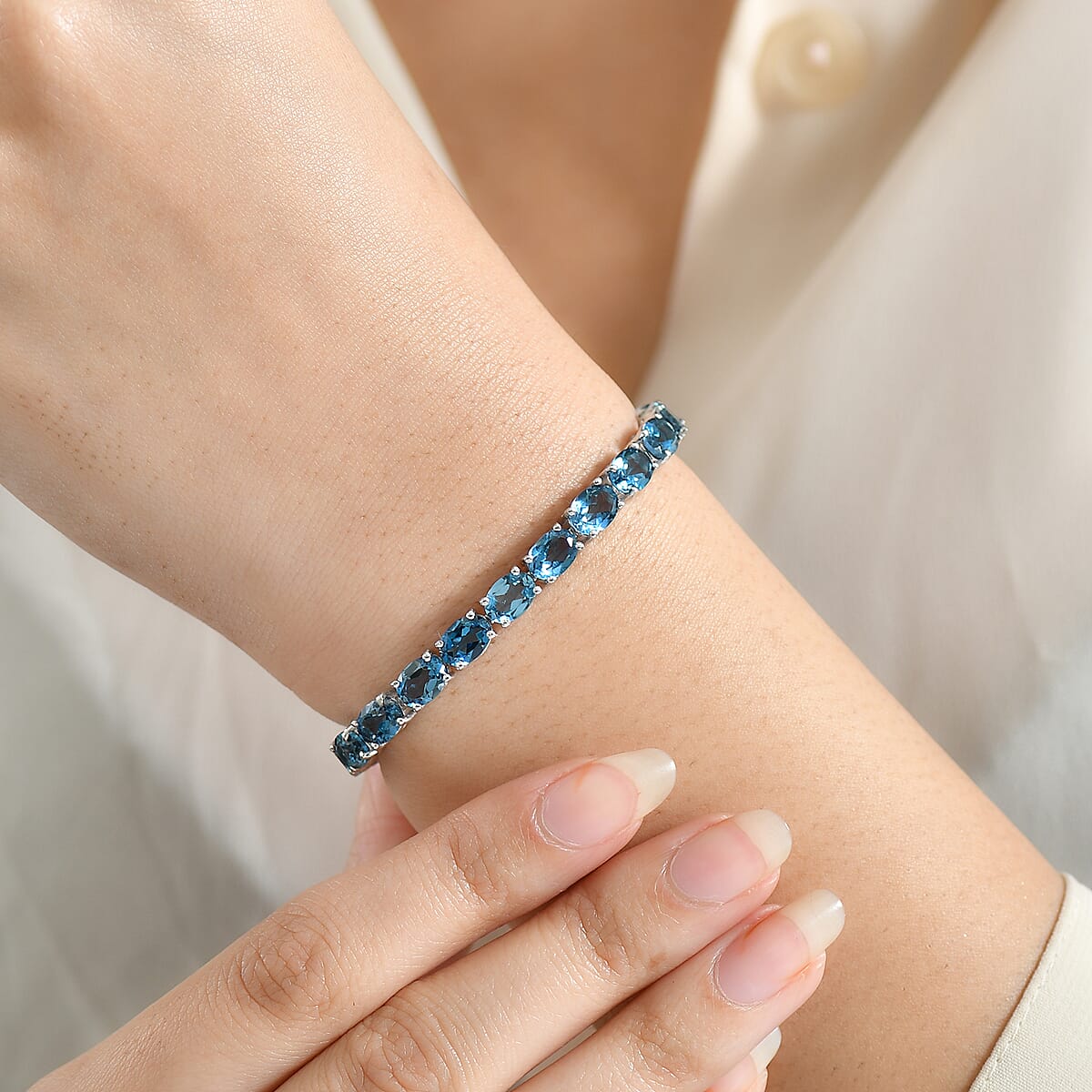 D'Joy London Blue Topaz 24.70 ctw Bracelet in Rhodium Over Sterling Silver (7.25 In) image number 2