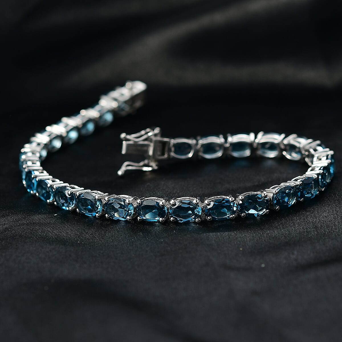 D'Joy London Blue Topaz 21.80 ctw Bracelet in Rhodium Over Sterling Silver (6.50 In) image number 1