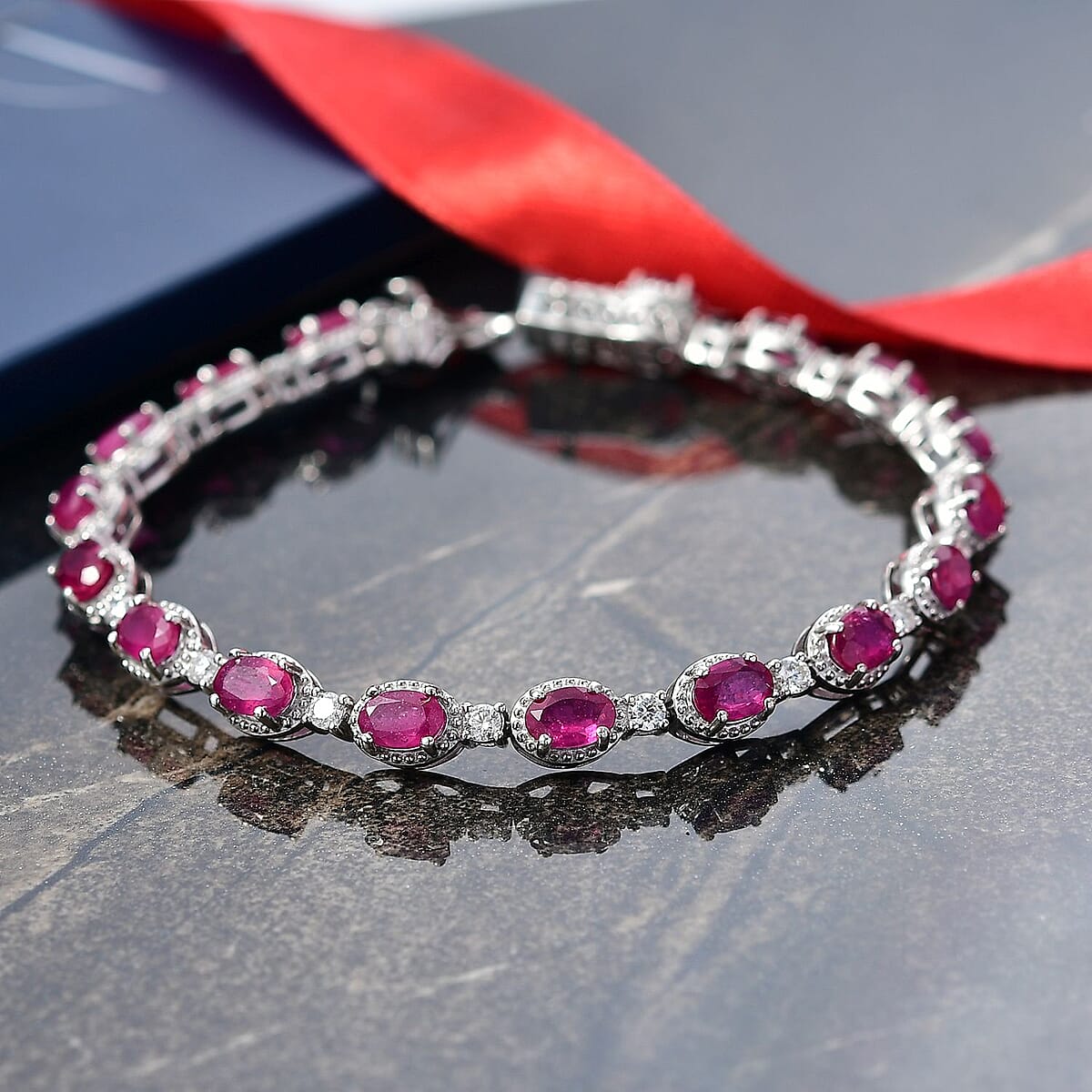 Doorbuster D'Joy Niassa Ruby (FF) and Moissanite 12.20 ctw Station Bracelet in Rhodium Over Sterling Silver (7.25 In) image number 1