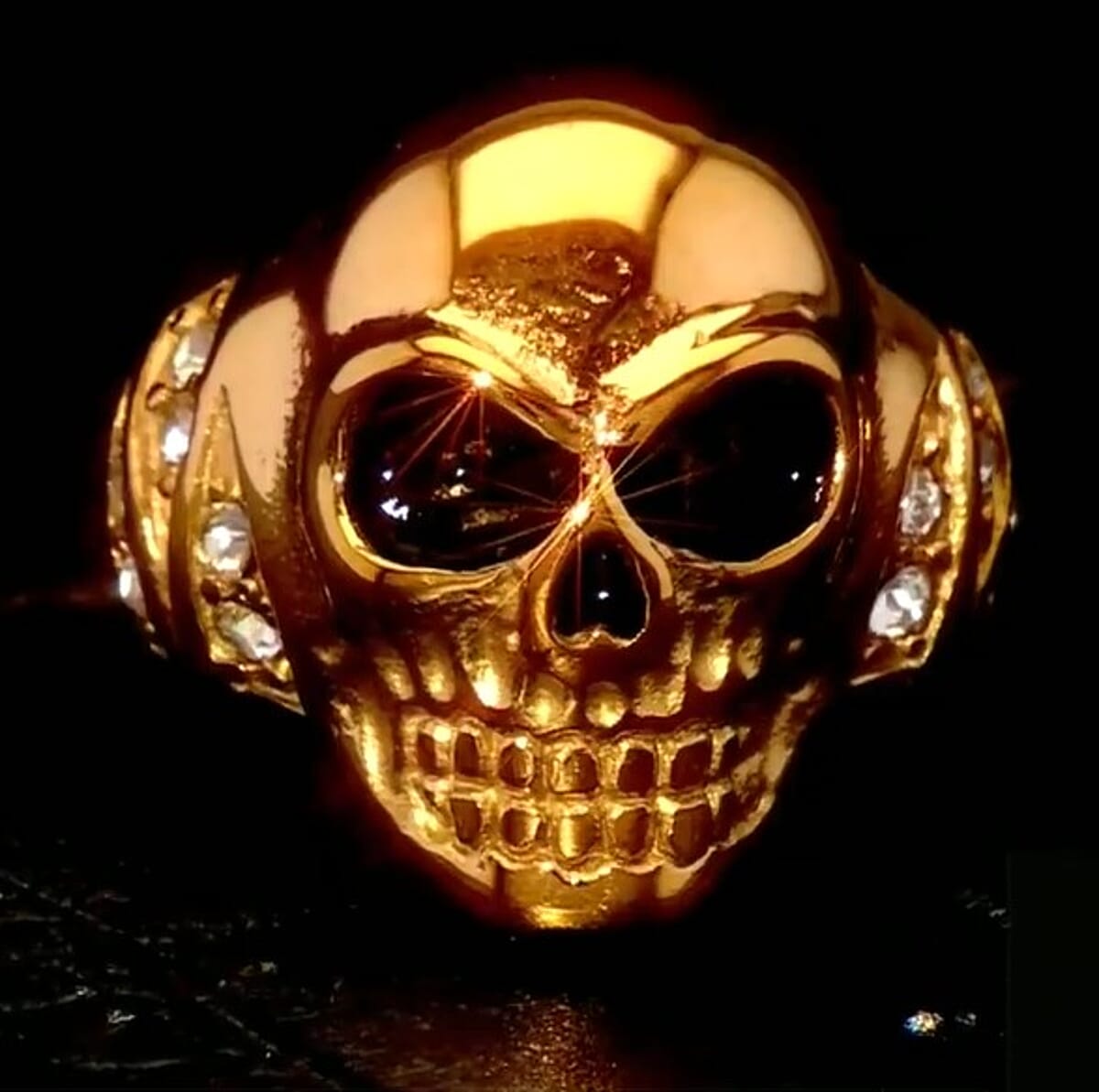 Simulated Diamond 0.30 ctw Bold Skull Ring in ION Plated YG Stainless Steel (Size 8.0) image number 1