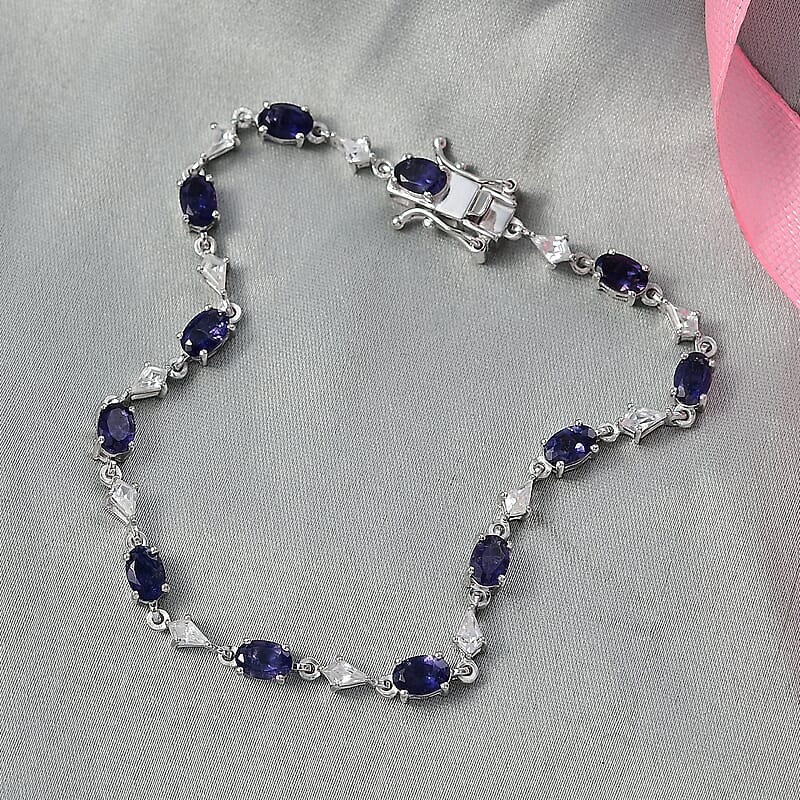 D'Joy Premium Catalina Iolite and White Zircon 5.60 ctw Crown Legacy Bracelet in Rhodium Over Sterling Silver (6.50 In)