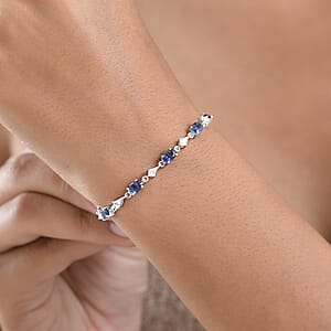 D'Joy Premium Catalina Iolite and White Zircon 6.35 ctw Crown Legacy Bracelet in Rhodium Over Sterling Silver (7.25 In)