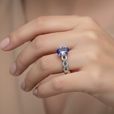 D'Joy Premium Tanzanite, Paraiba Tourmaline and Diamond 1.50 ctw Royal Infinity Ring in Rhodium Over Sterling Silver (Size 10.0)