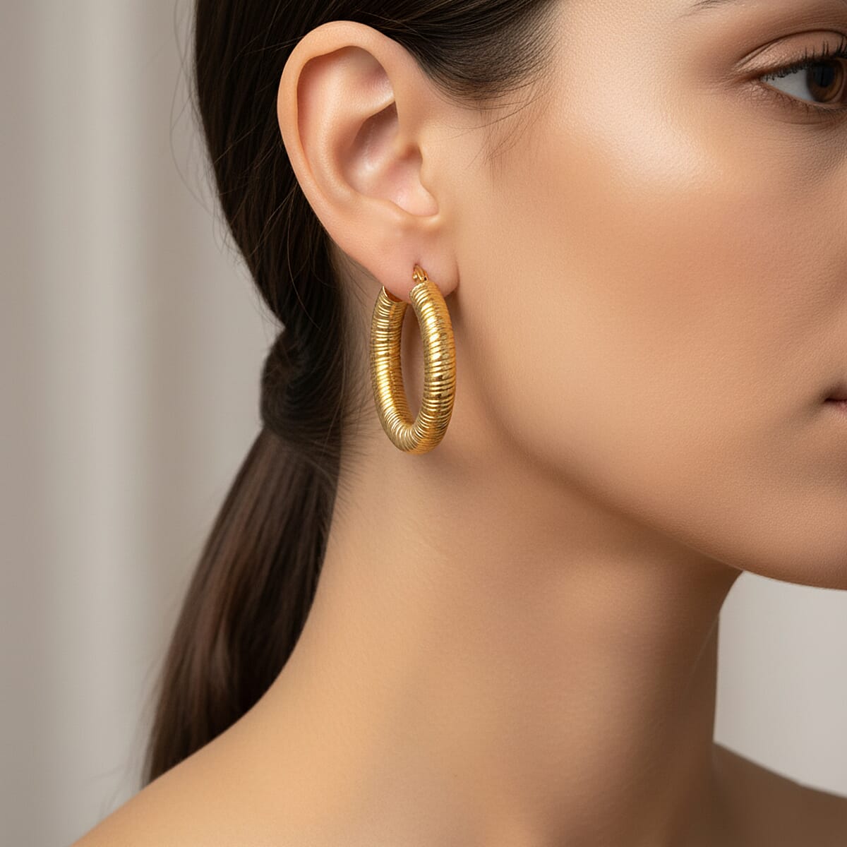 Classic Textured Hoop Earrings in ION Plated YG Stainless Steel image number 2