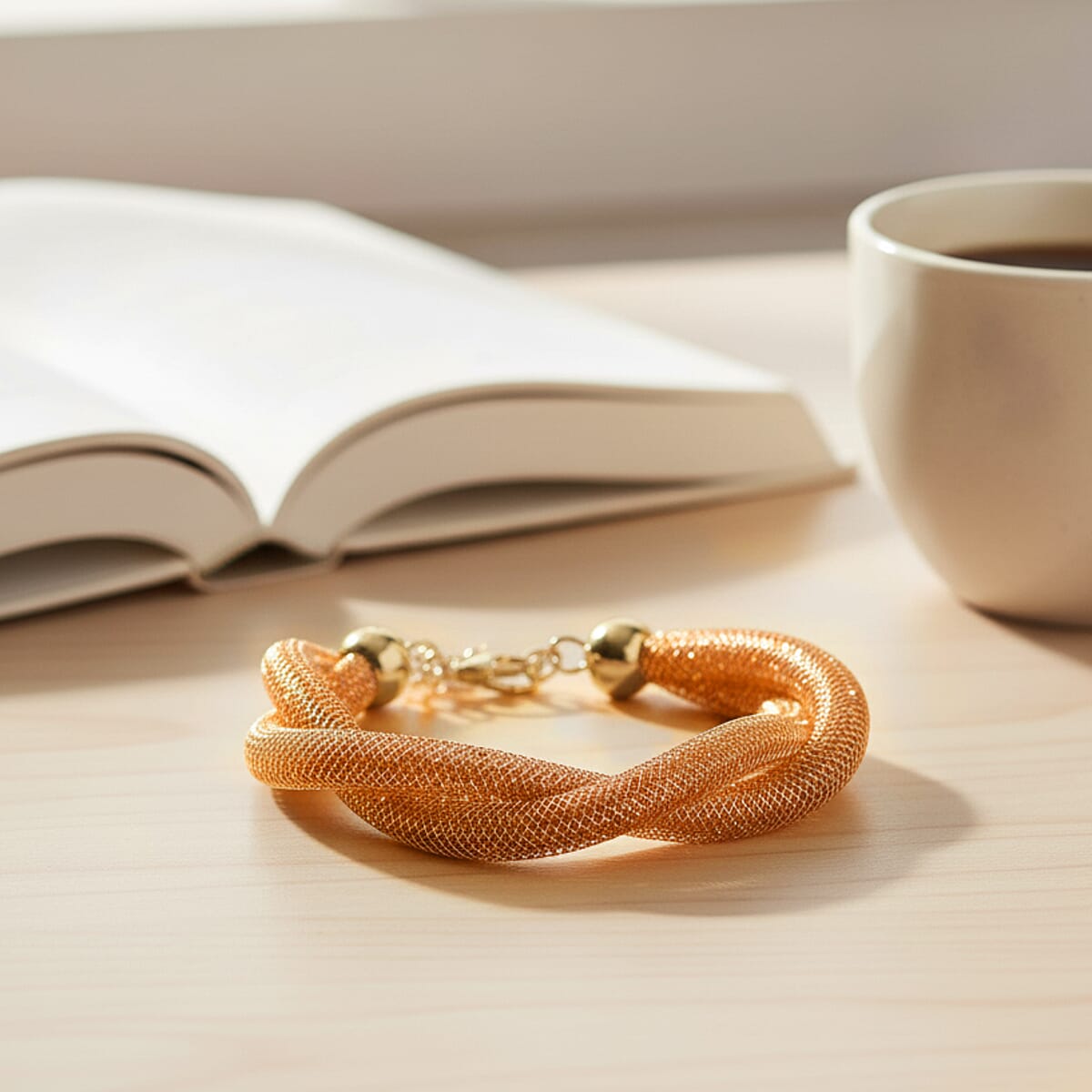 Champagne Austrian Crystal Twisted Rope Bracelet in Goldtone (8.50-10.5In) image number 1