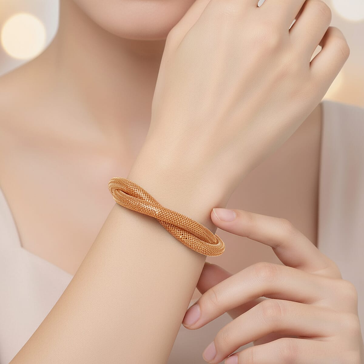 Champagne Austrian Crystal Twisted Rope Bracelet in Goldtone (8.50-10.5In) image number 2