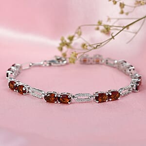 D'Joy Premium Red Citrine and Moissanite 6.10 ctw Chain of Flames Bracelet in Rhodium Over Sterling Silver (7.25 In)
