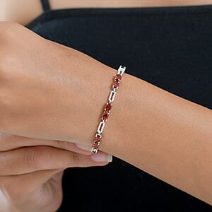 D'Joy Premium Red Citrine and Moissanite 6.10 ctw Chain of Flames Bracelet in Rhodium Over Sterling Silver (7.25 In)