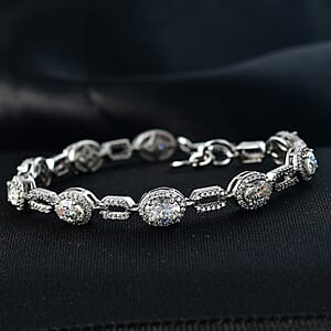 D'Joy Strontium Titanate and Moissanite 8.35 ctw Oval Symphony Bracelet in Rhodium Over Sterling Silver (7.25 In)