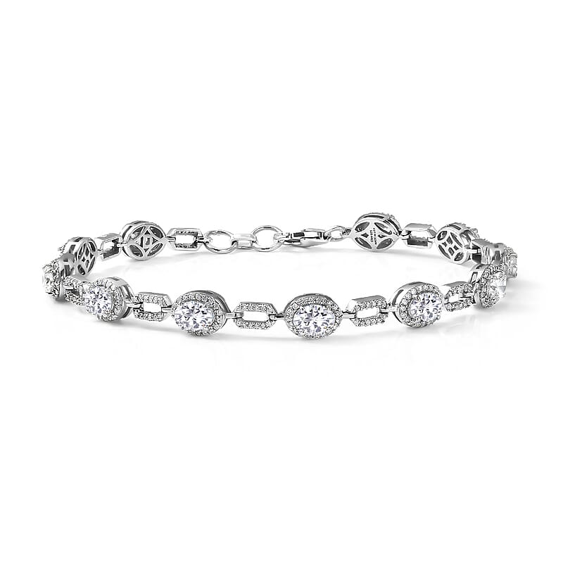 D'Joy Strontium Titanate and Moissanite 7.15 ctw Oval Symphony Bracelet in Rhodium Over Sterling Silver (6.50 In)