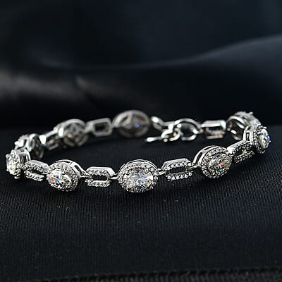 D'Joy Strontium Titanate and Moissanite 7.15 ctw Oval Symphony Bracelet in Rhodium Over Sterling Silver (6.50 In)