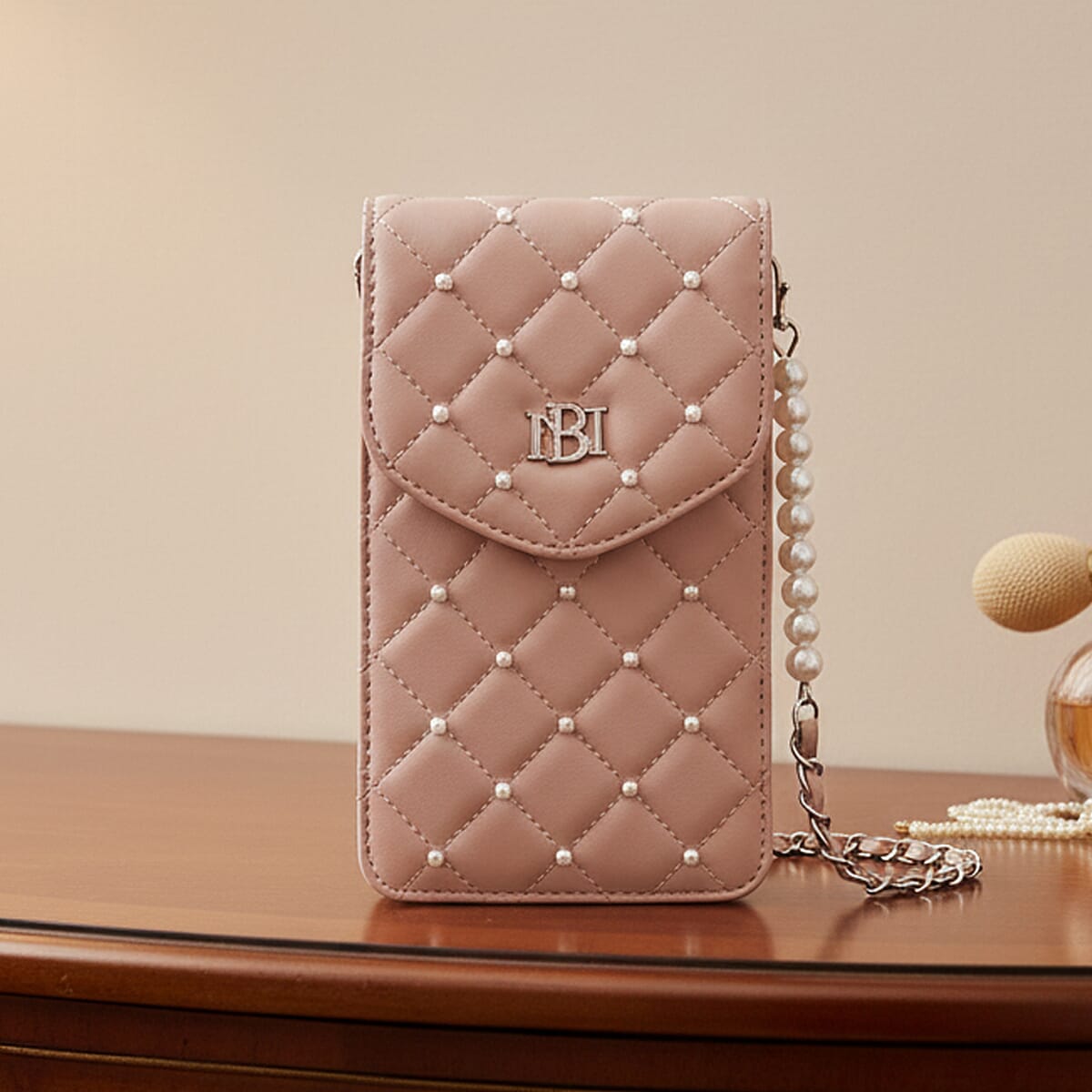 Closeout Badgley Mischka Pink Vegan Leather Quilted Pearl Cell Phone Crossbody Bag image number 1