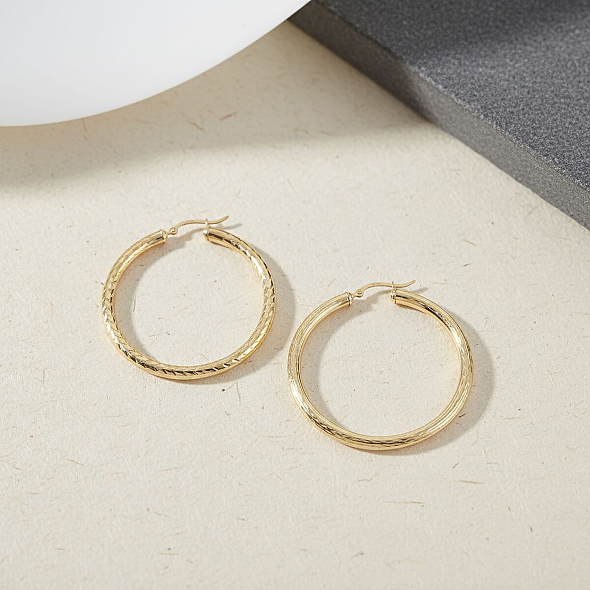 Doorbuster Textured Hoop Earrings in 10K Yellow Gold 4.63 Grams image number 1
