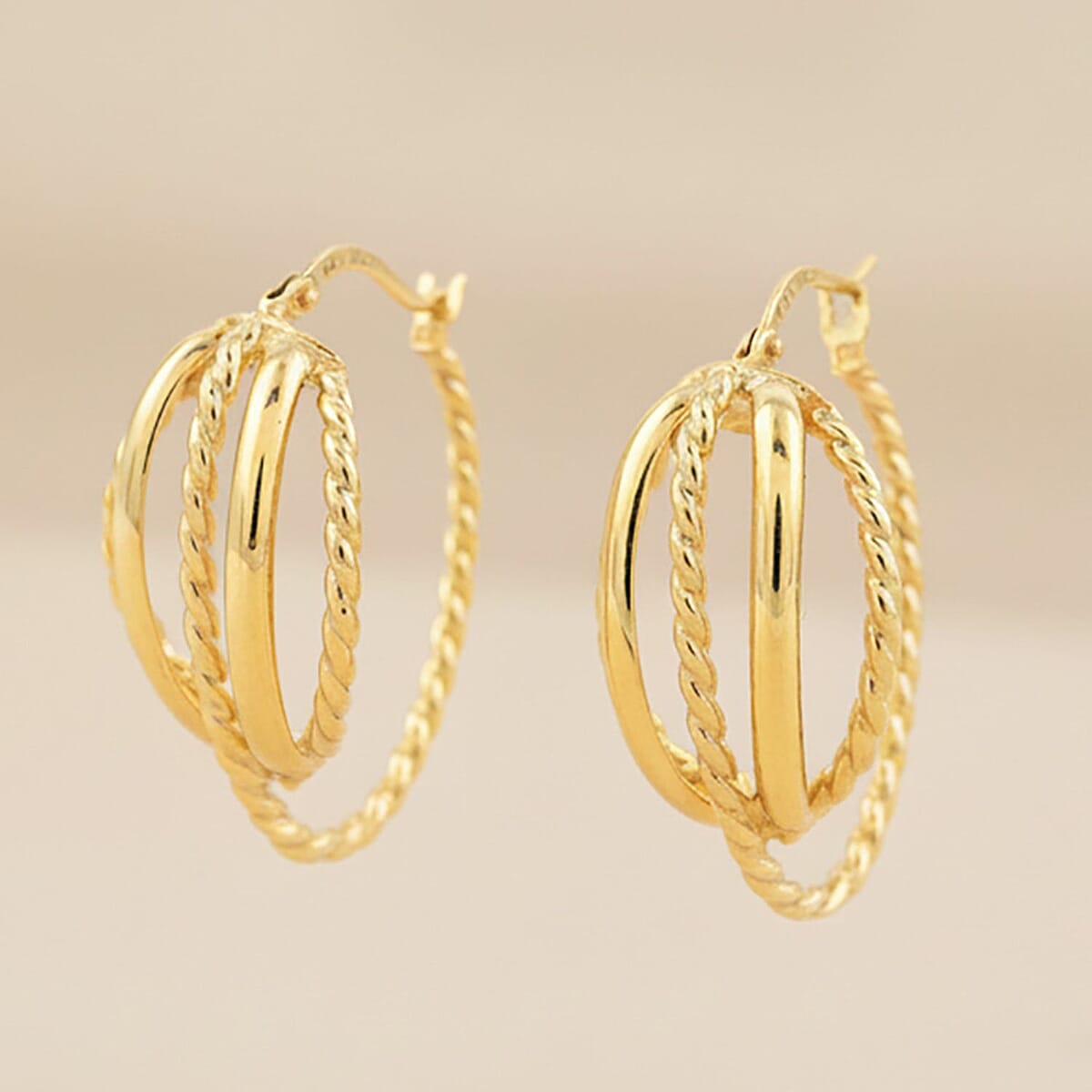 Doorbuster Italian Twisted Oval Hoop Earrings in 14K Yellow Gold 2.92 Grams image number 1