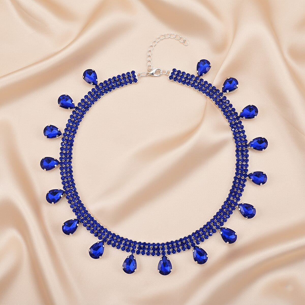 Sparkling Blue Austrian Crystal Dripping Necklace (16-19 Inches) in Silvertone image number 1